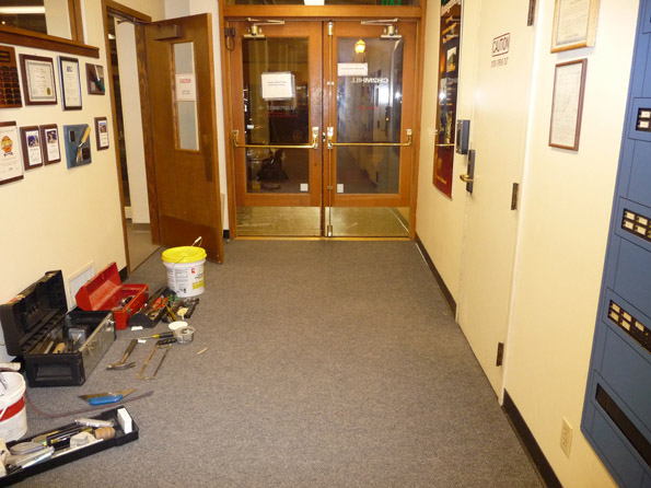 Carpet repair in firehall -before